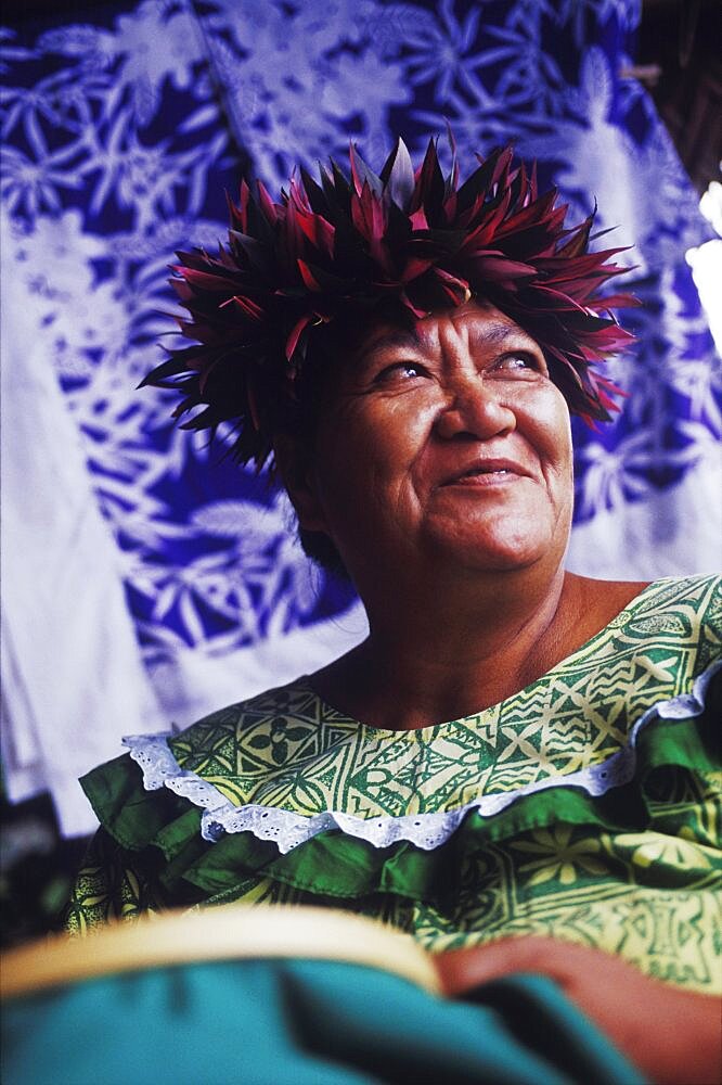 Close-up of a mature woman embroidering cloth, Hawaii, USA