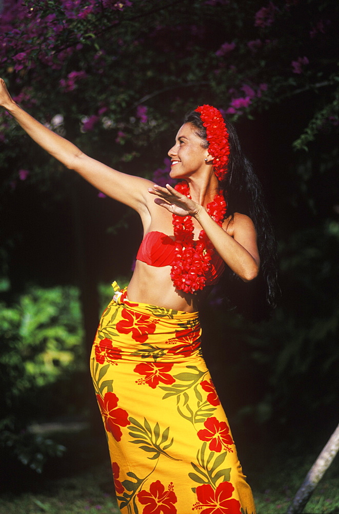 Close-up of a young woman dancing, Hawaii, USA