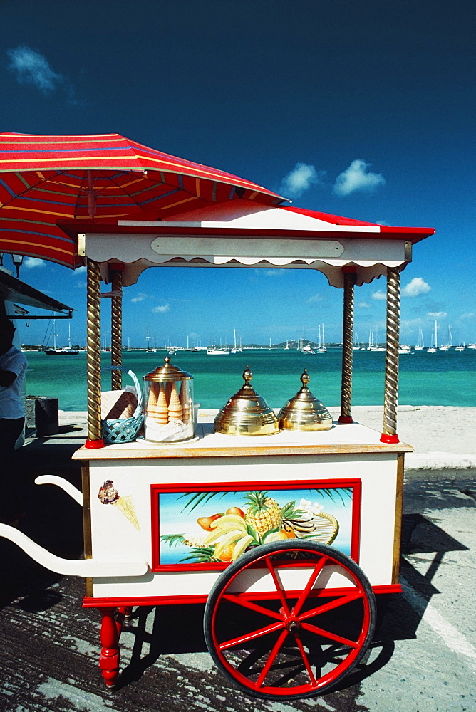 Side view of a cart with a brass lid and ice-cream cone placed on it, St. Martin