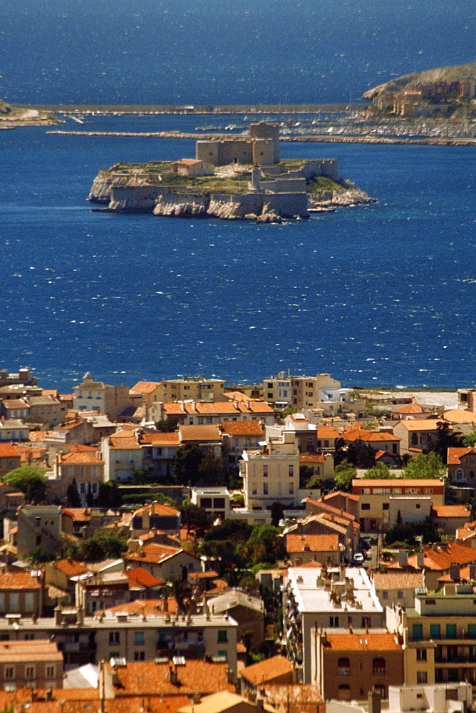 High angle view of a modern city and Chateau D'IF, Marseille, France