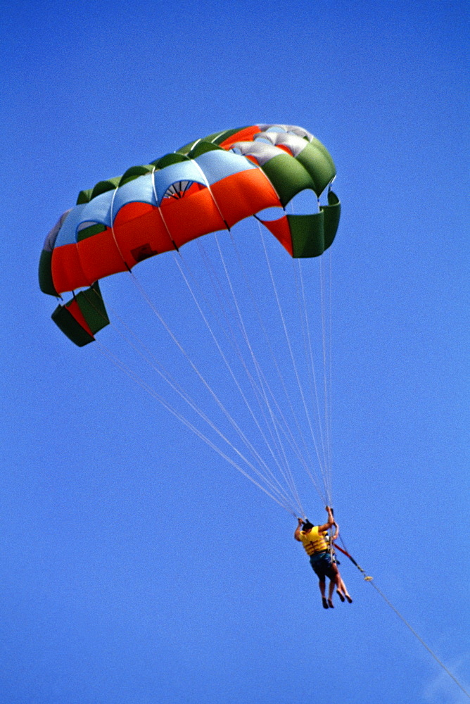 Two people parasailing, Crystal Palace Hotel, Nassau, Bahamas