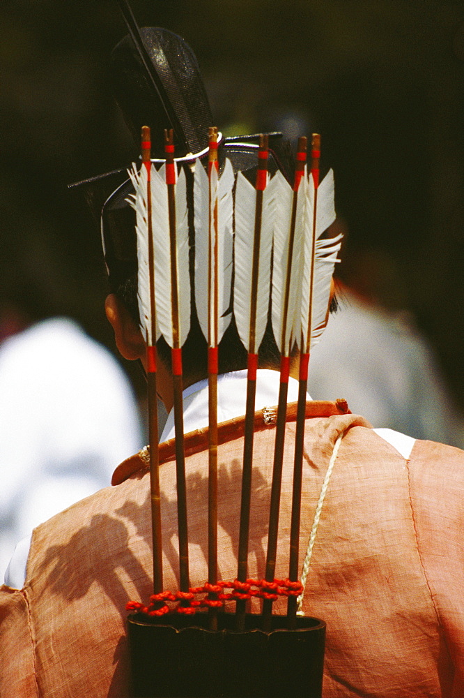 Rear view of a person carrying a quiver with arrows on his shoulders, Hollyhock Festival, Kyoto Prefecture, Japan