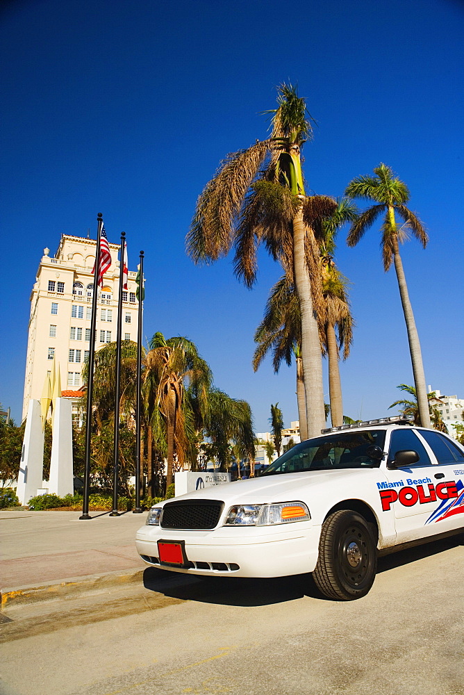 Police car parked in front of a building, Miami, Florida, USA