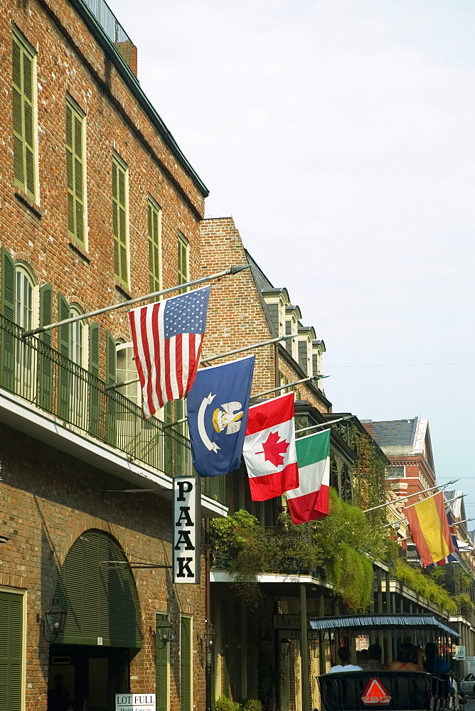 National flags on balconies of buildings, New Orleans, Louisiana, USA