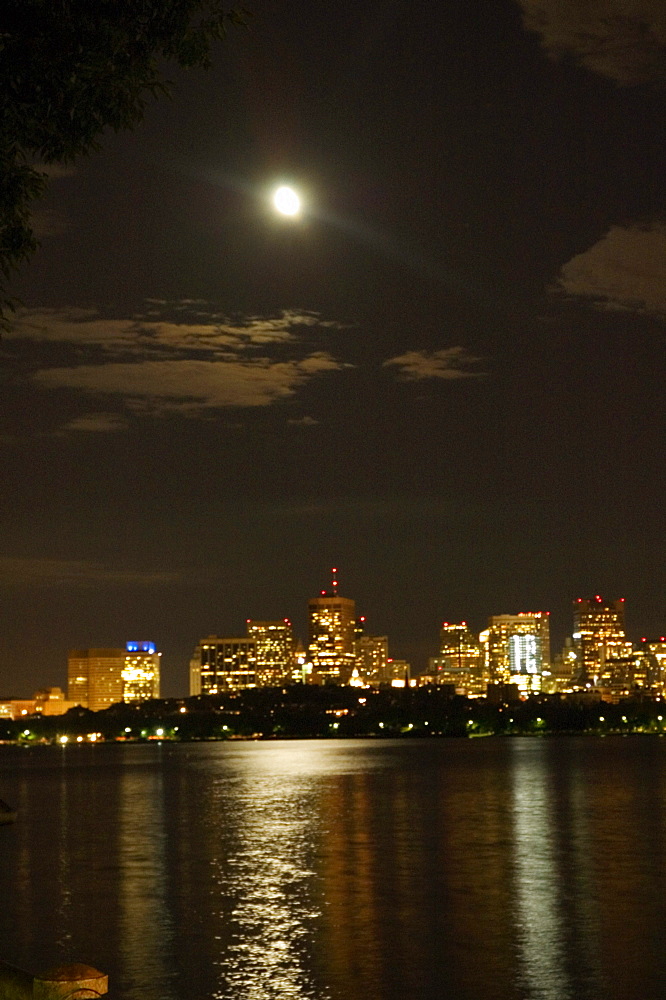 Buildings at the waterfront lit up at night, Boston, Massachusetts, USA