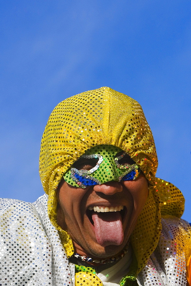 Close-up of a man sticking his tongue out