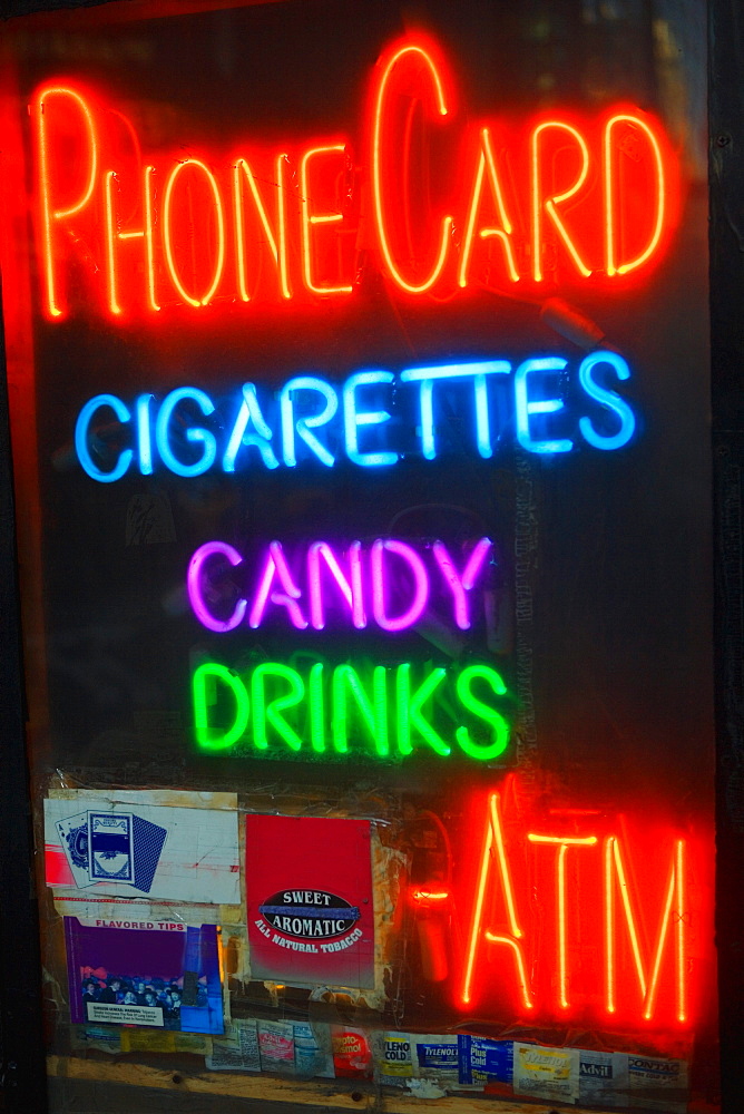 Close-up of a neon sign of a department store