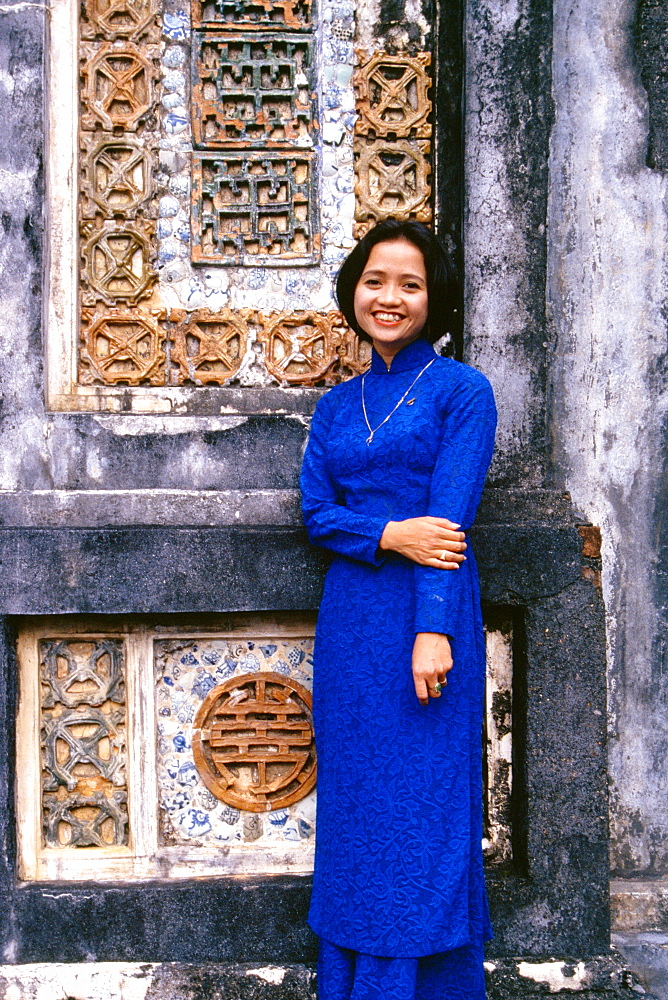 Woman in Ao Dai at Forbidden City, Hue, Vietnam