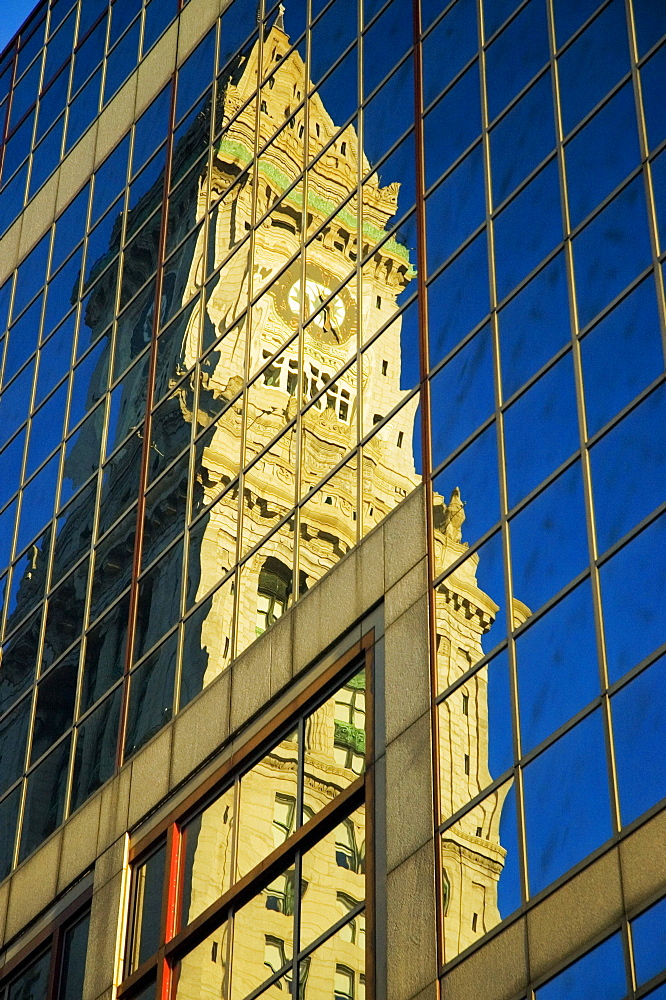 Low angle view of the reflection of a tower on the glass front of a building, Custom House, Boston, Massachusetts, USA