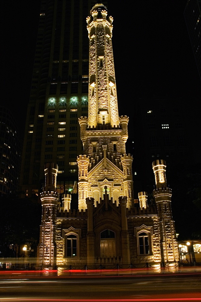 Tower lit up at night, Water Tower, Chicago, Illinois, USA