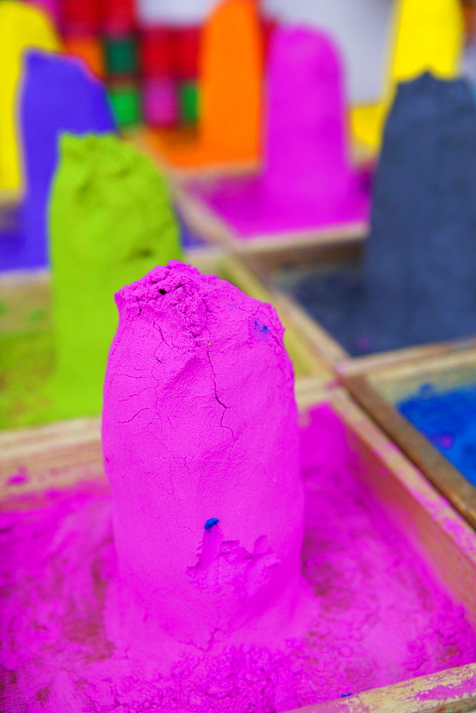 Close-up of mounds of colored powder used for Hindu rituals, Pushkar, Rajasthan, India