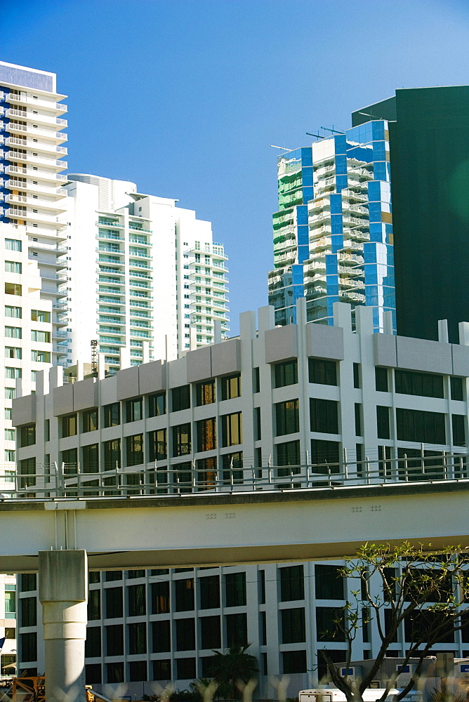 Low angle view of a bridge in front of buildings, Miami, Florida, USA