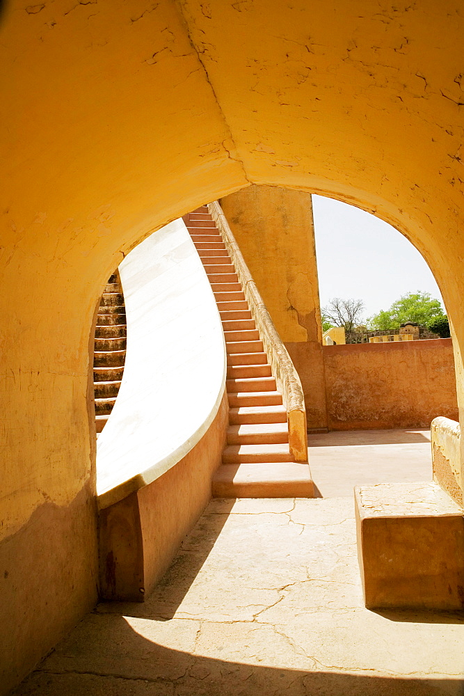 Steps viewed from an arched doorway, Jantar Mantar, Jaipur, Rajasthan, India