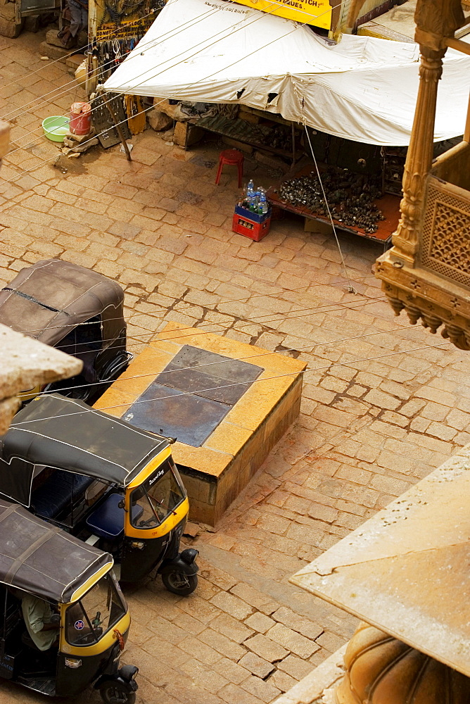 High angle view of rickshaws parked on the street, Jaisalmer, Rajasthan, India