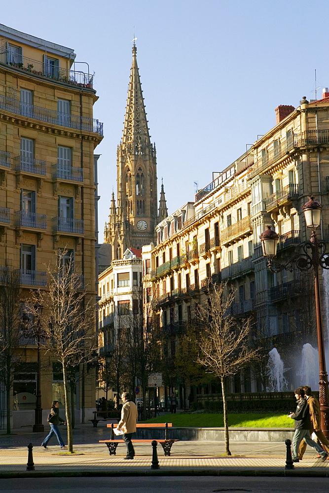 Four people walking on the street, Spain