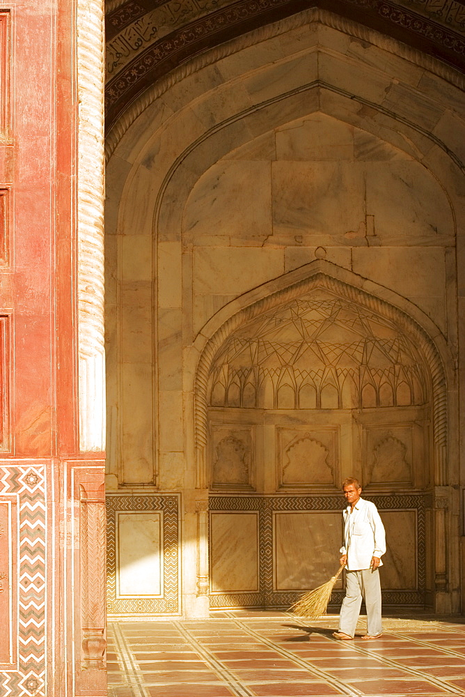 Portrait of a man standing in the Jawab Mosque, Agra, Uttar Pradesh, India