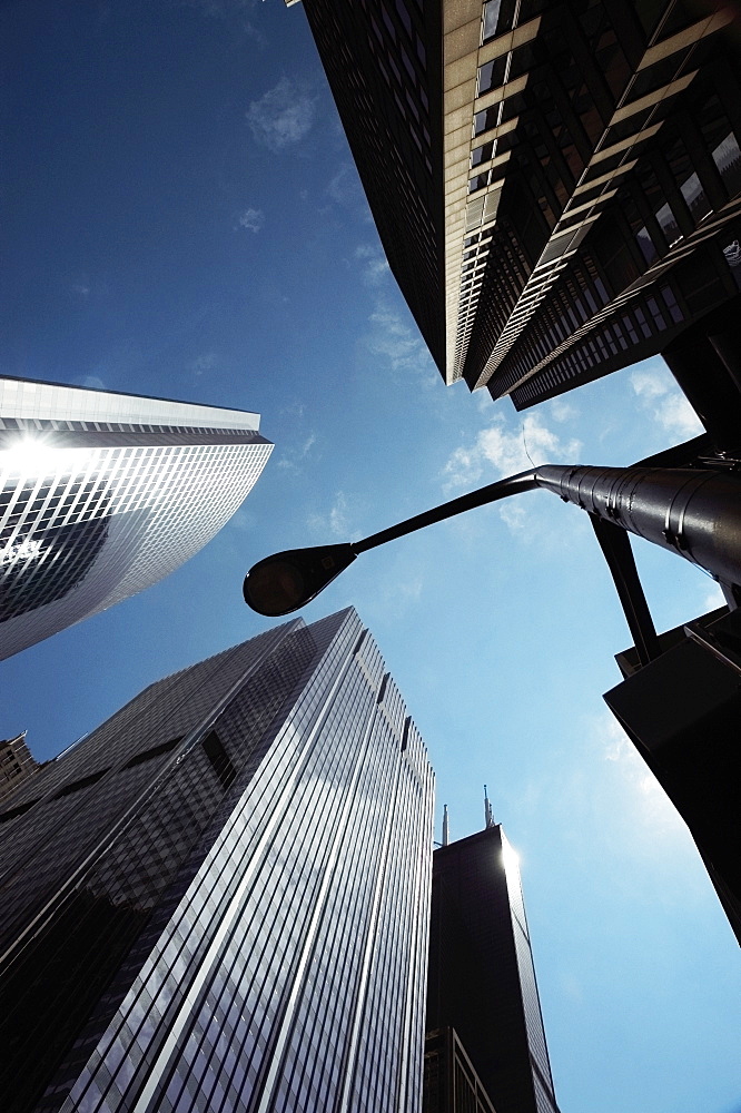 Low angle view of skyscrapers in a city, Chicago, Illinois, USA