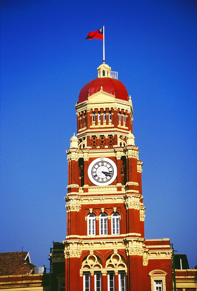 Low angle view of a clock tower of a government building, Supreme Court, Yangon, Myanmar