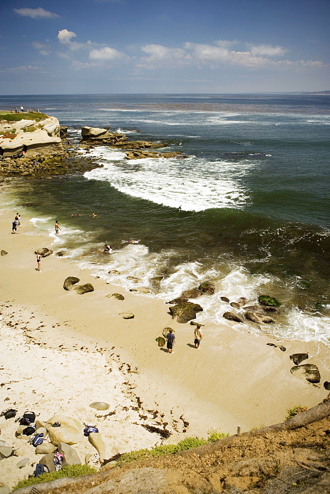 High angle view of people on the beach, La Jolla Reefs, San Diego, California, USA