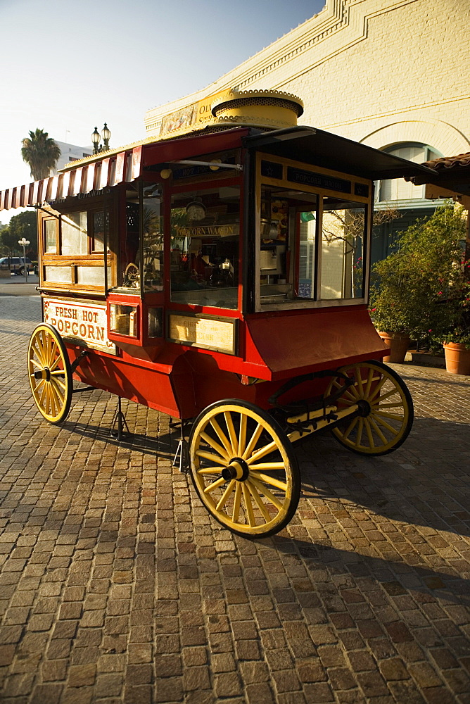 Popcorn cart parked on a street side