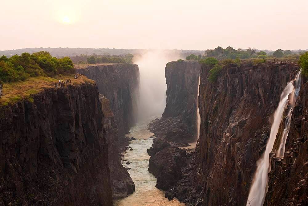 Victoria Falls, huge waterfalls of the Zambezi river flowing over sheer cliffs, Zambia