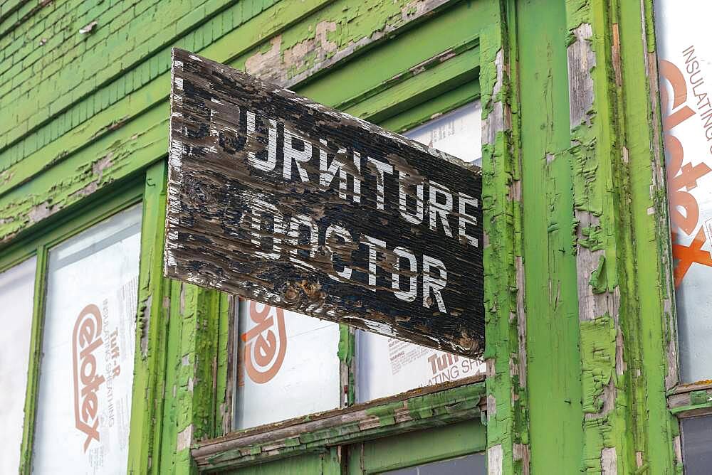 Abandoned business, Furniture Doctor sign above front door