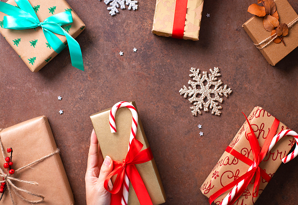 Christmas, overhead view of wrapped presents and decorations on a table