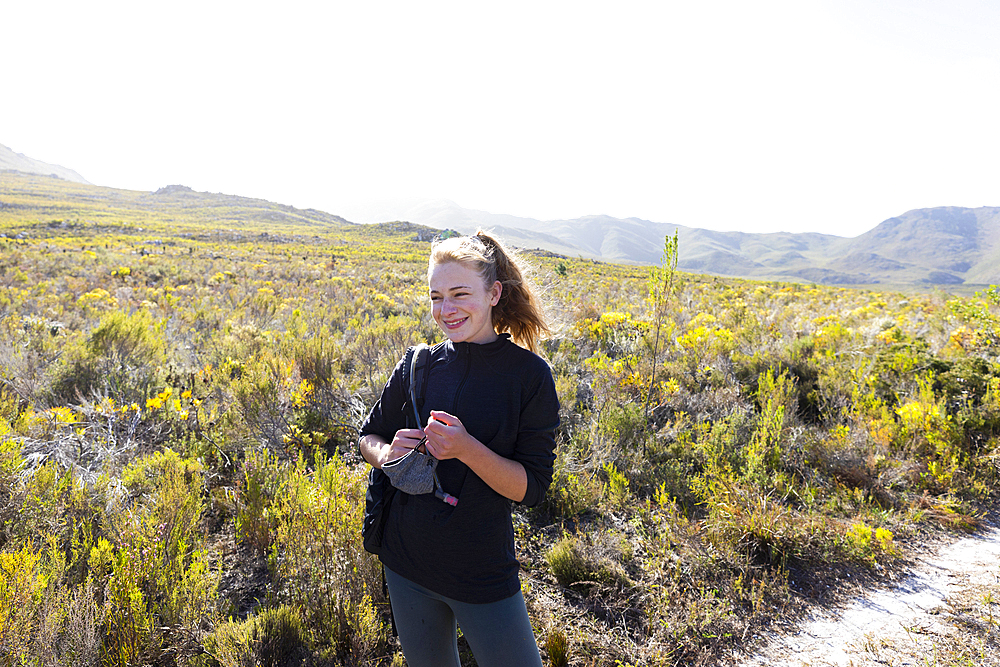 Teenage girl on Waterfall nature trail, Stanford, South Africa.