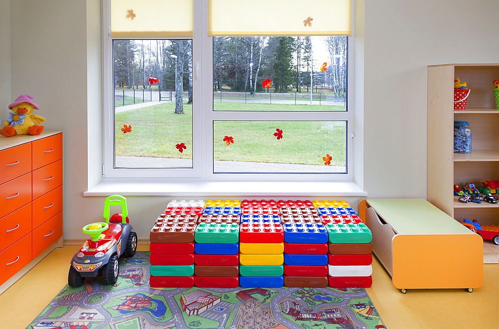 Modern day care nursery or pre-school kindergarten school, spacious interiors, play equipment