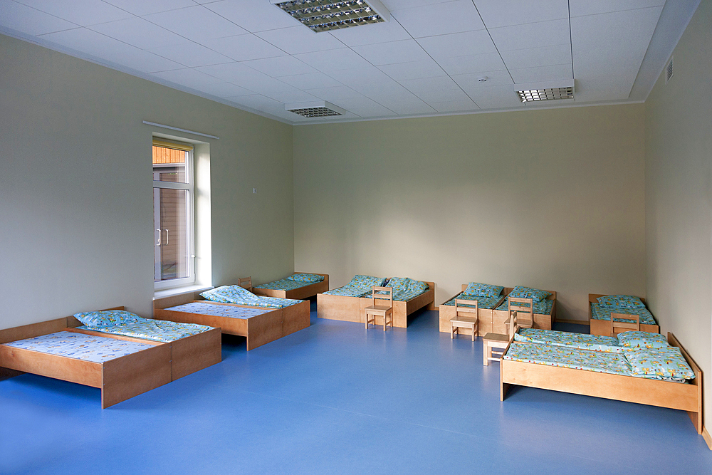 Modern day care nursery or pre-school kindergarten school, bedrooms for nap time