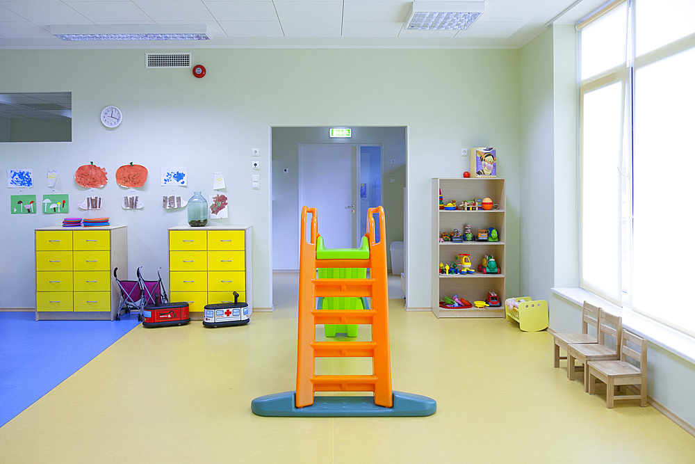 Modern children's day care or pre-school building, open indoors play area