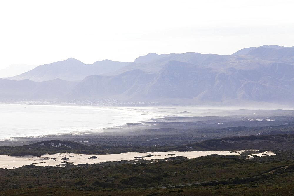 View of a mountain range and river estuary, mist and sea fret, coastline, Klein Mountains, Western Cape, South Africa