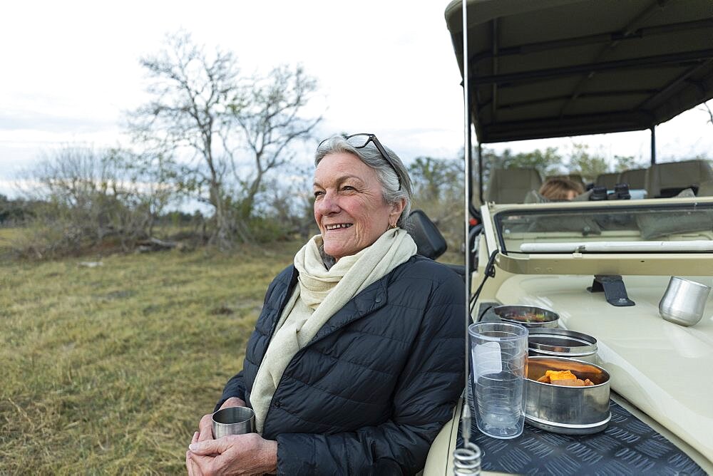 senior woman smiling, Okavango Delta, Botswana, Okavango Delta, Botswana