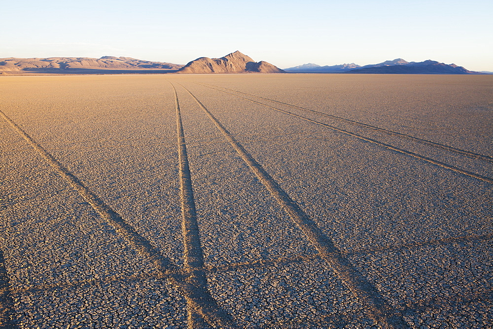 Tyre marks and tracks in the playa salt pan surface of Black Rock Desert, Nevada, Black Rock Desert, Nevada, USA