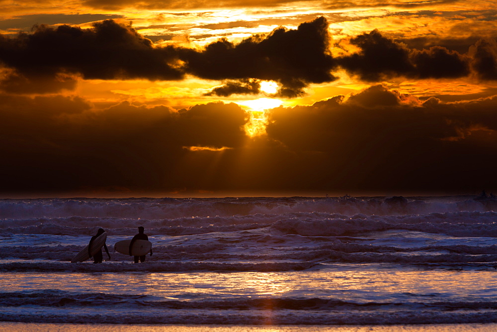 Surfers on Cannon Beach, Oregon, USA, Cannon Beach, Oregon, USA