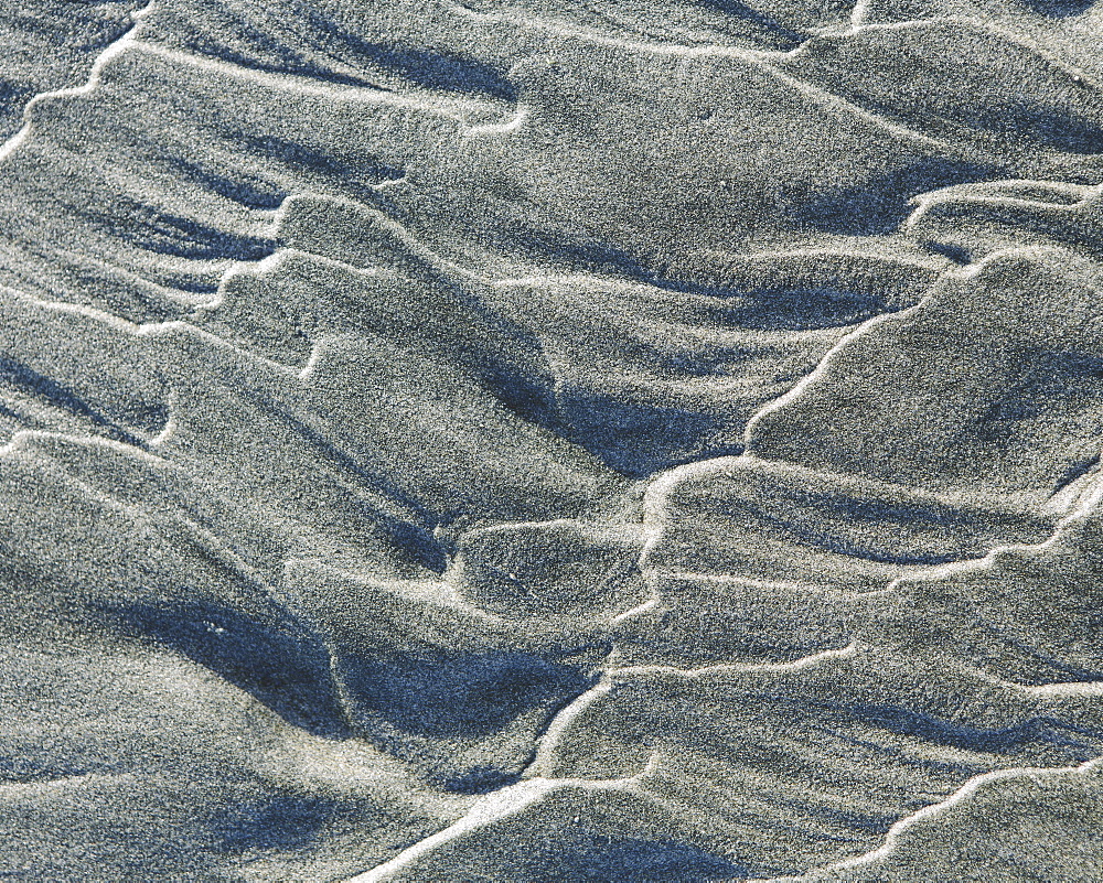 Close up of erosional sand patterns on beach and intertidal zone, Ocean Park, Pacific County, Washington, USA