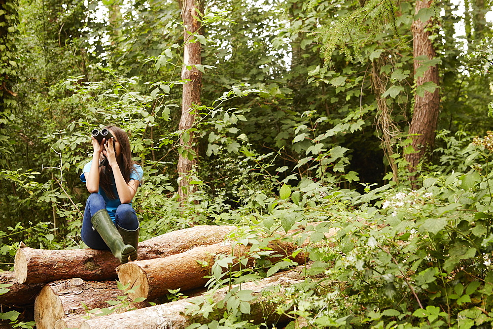 A young girl, a birdwatcher, Bristol, Avon, England