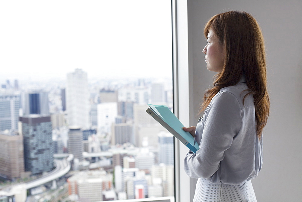 A working woman in an office building, Sakai City, Osaka, Japan