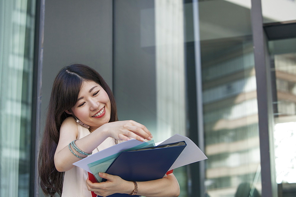 A working woman in an office building, Sakai City, Osaka, Japan