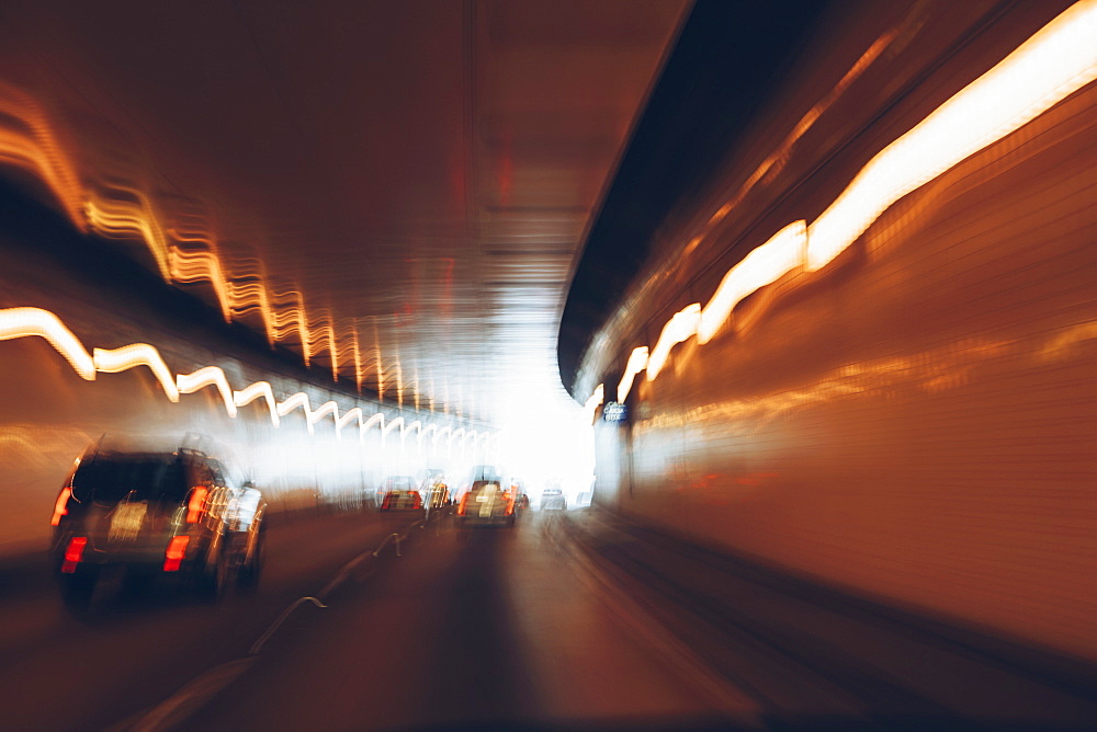 Cars driving through tunnel, long exposure, USA