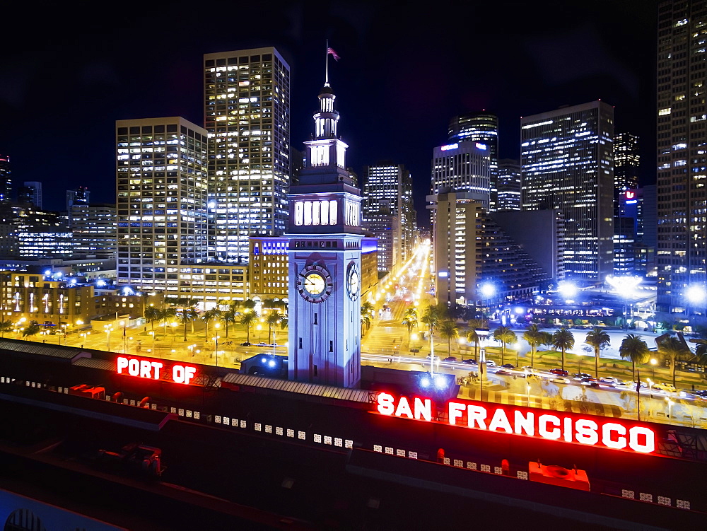 View from the air of the Ferry Building in San Francisco, at night, The city buildings of downtown and the waterfront buildings, New York City, USA