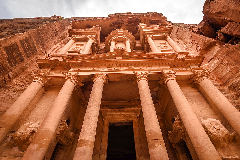 Low angle exterior view of the rock-cut architecture of Al Khazneh or The Treasury at Petra, Jordan, Petra, Jordan