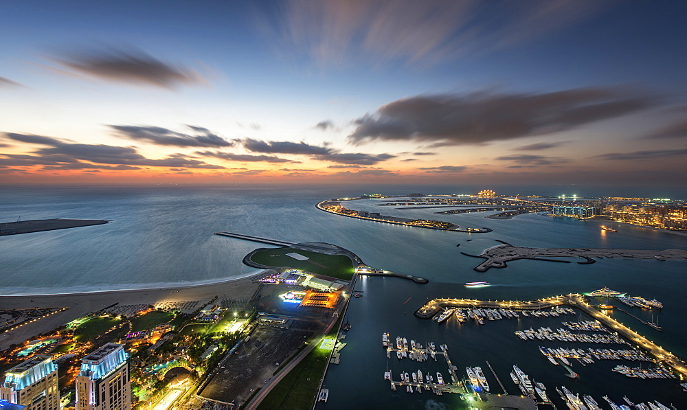 Aerial view of marina and Persian Gulf at dusk, Dubai, United Arab Emirates, Dubai, United Arab Emirates