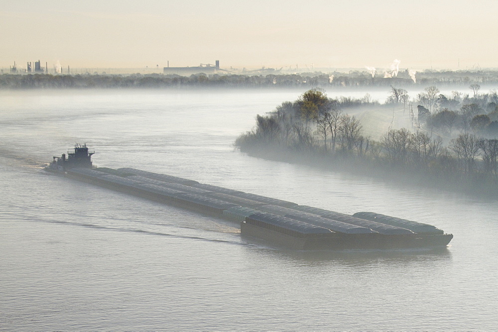 Mist Shrouded River and Tugboat, Louisiana, USA