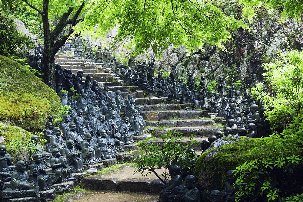 Statues lining steps in temple garden, Honshu island, Japan, Asia, Honshu island, Japan, Asia