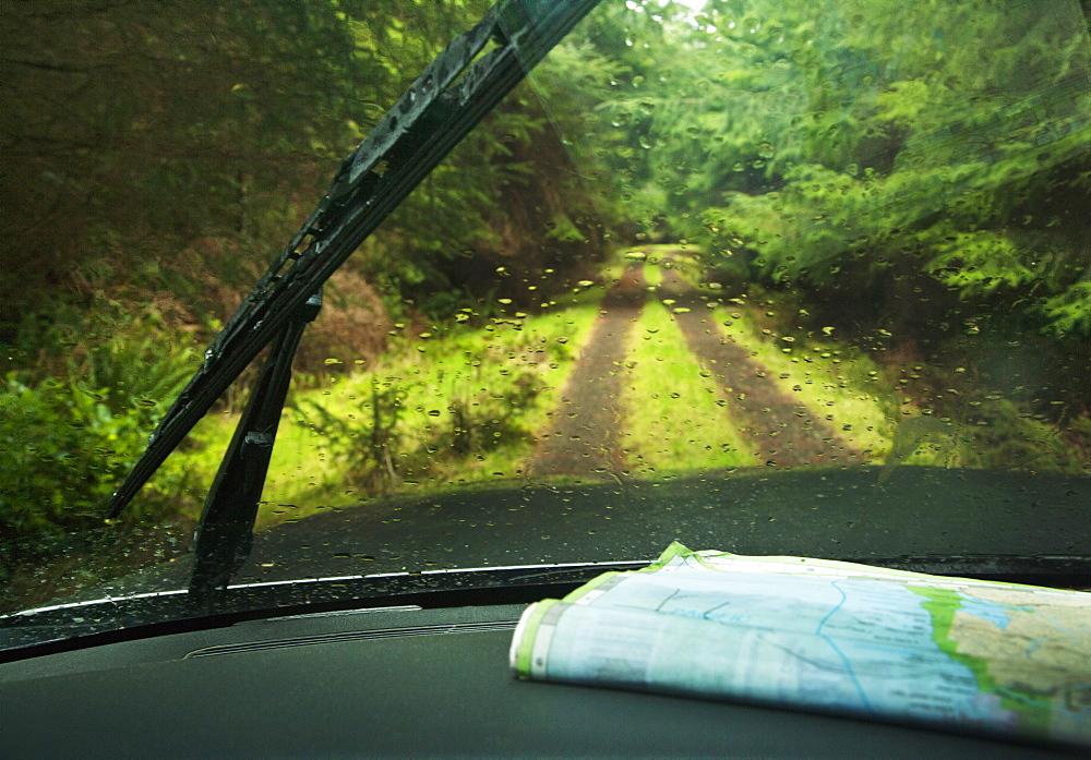 Windshield wipers and map on dashboard of car, Olympic Peninsula, Washington, USA