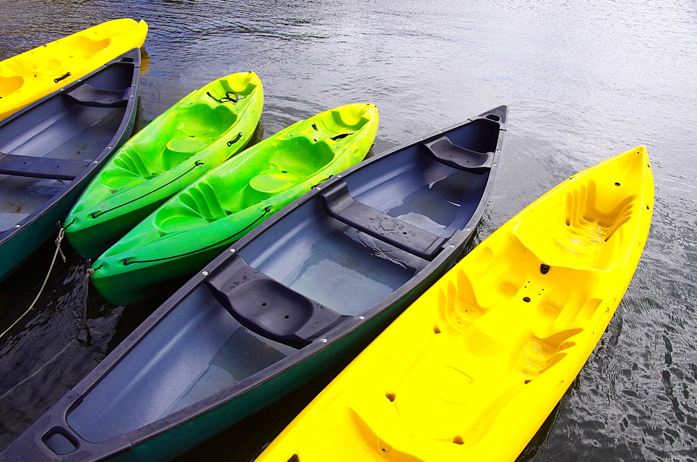 Empty canoes mooring on lake, Rural, Alentejo, Portugal