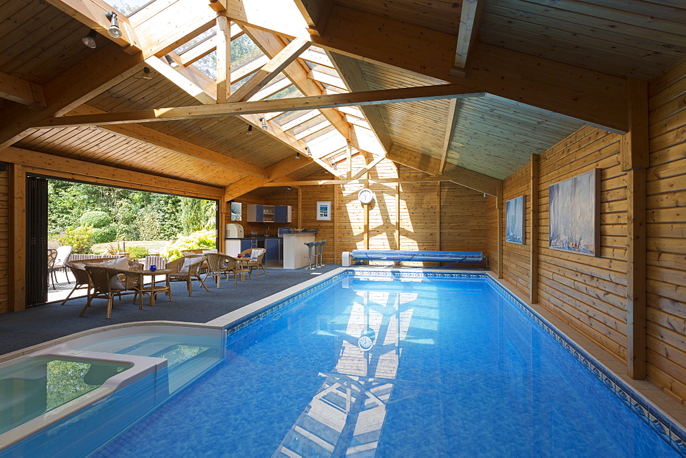 Indoor swimming pool under skylight, Farnham Royal, Buckinghamshire, UK