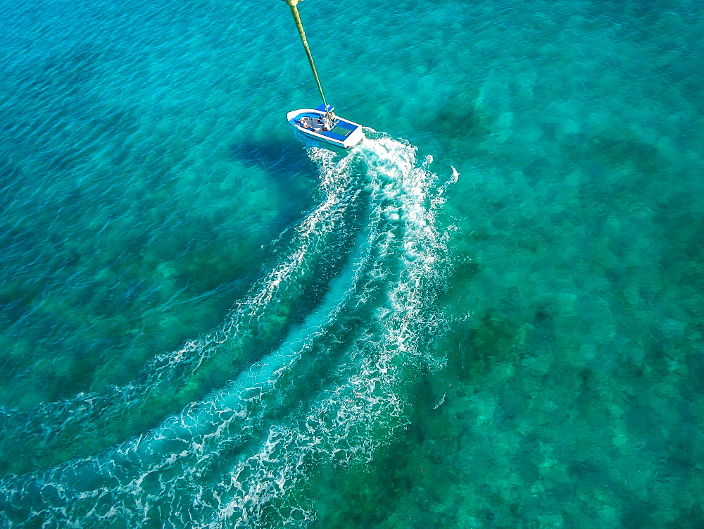 Speedboat turning in ocean, Carribean