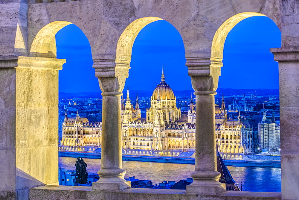 View of Parliament Building illuminated at dusk, Budapest, Hungary